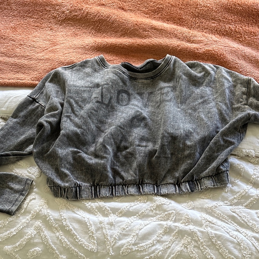 Cropped Washed Black Sweatshirt with Subtle Graphic